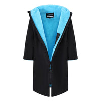 SALTIE Changing Robe in blue, weather resistant, perfect for changing on the beach and made using 100% recycled materials. The SALTIE changing robe is designed keep you warm and dry during your sea swim, beach walks and all of your outdoor adventures.